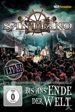 DVD-Cover einer Band, die live auf der Bühne spielt. Publikum im Vordergrund, Bühne im Hintergrund.