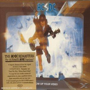 AC/DC-Albumcover. Ein Mann mit Gitarre springt aus einem kaputten Fernseher. Bandname oben.