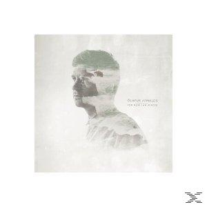 Albumcover: Portrait eines Mannes mit überlagerten Landschaften und Text. Weißer Hintergrund.