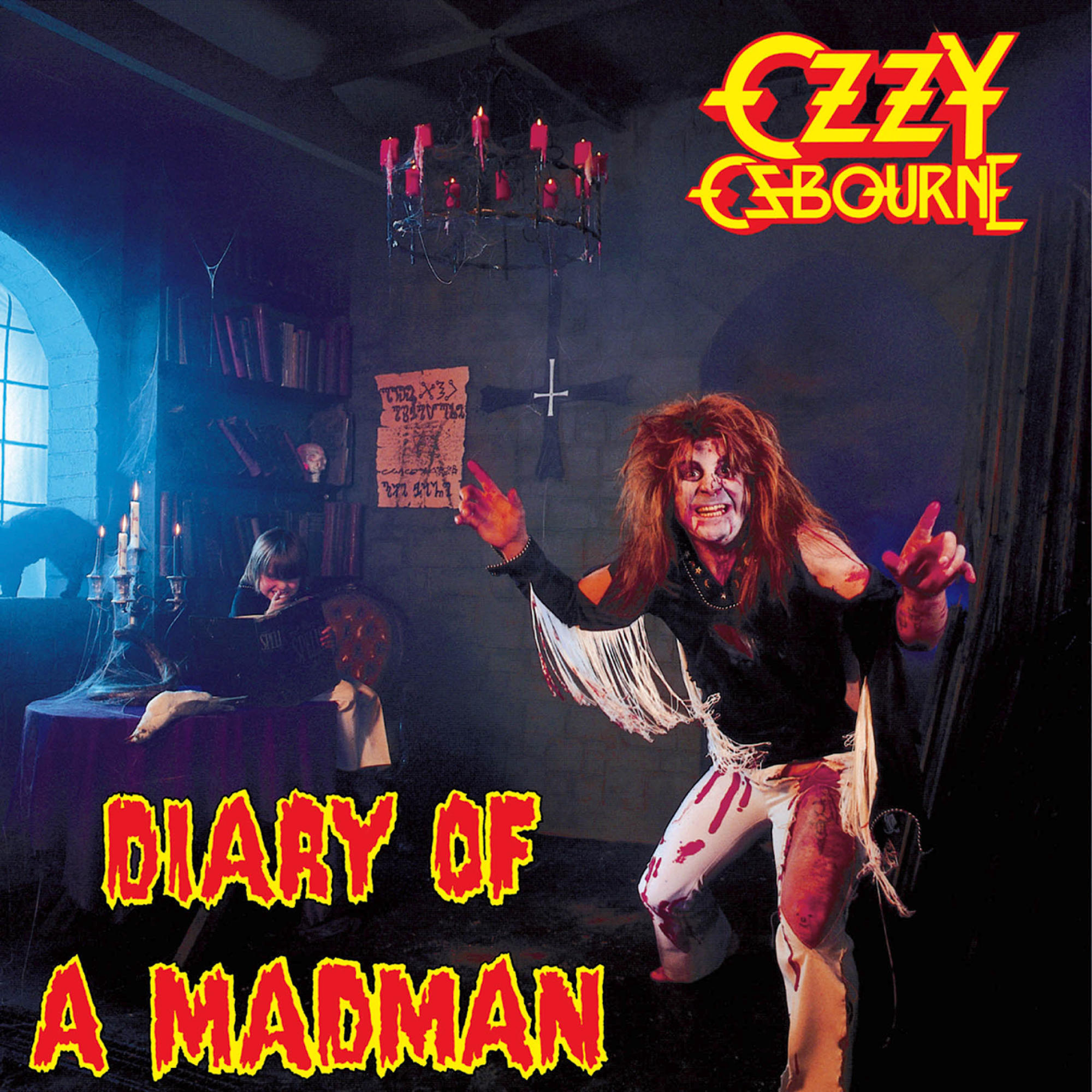 Ozzy Osbourne Albumcover, mit Ozzy in Kostüm in einem dunklen Raum mit einem Kreuz.