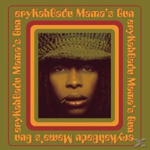 Erykah Badu-Albumcover, Nahaufnahme eines Frauengesichts mit Hut. Der Hintergrund ist grün und orange.