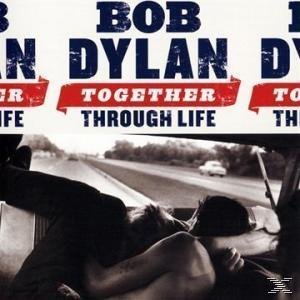Albumcover mit rotem Banner: 'Together Through Life'. Schwarz-Weiß-Bild.
