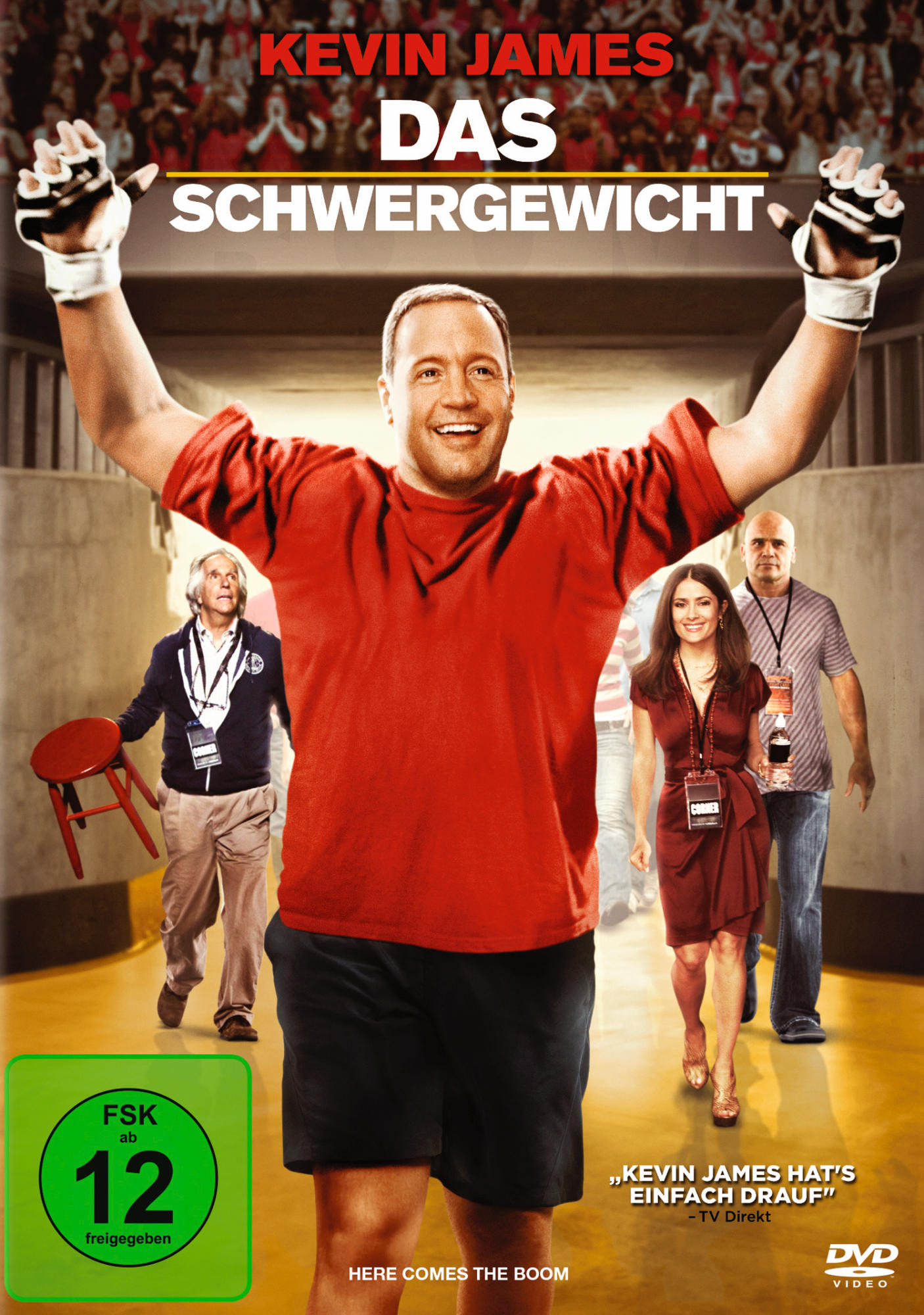 DVD-Cover: 'Here Comes the Boom' mit Kevin James, Arme erhoben, und Personen im Hintergrund.