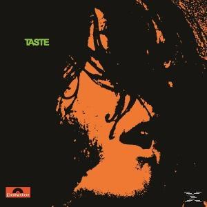 Ein abstraktes Albumcover mit orangefarbenen und schwarzen Farben. Das Wort 'TASTE' steht links.