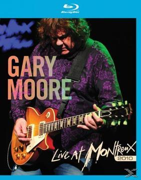 Gary Moore Live at Montreux DVD-Cover. Ein Mann spielt Gitarre, mit blauem Hintergrund.