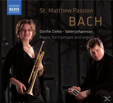Albumcover mit zwei Personen, einer Frau mit Trompete und einem Mann mit Keyboard.