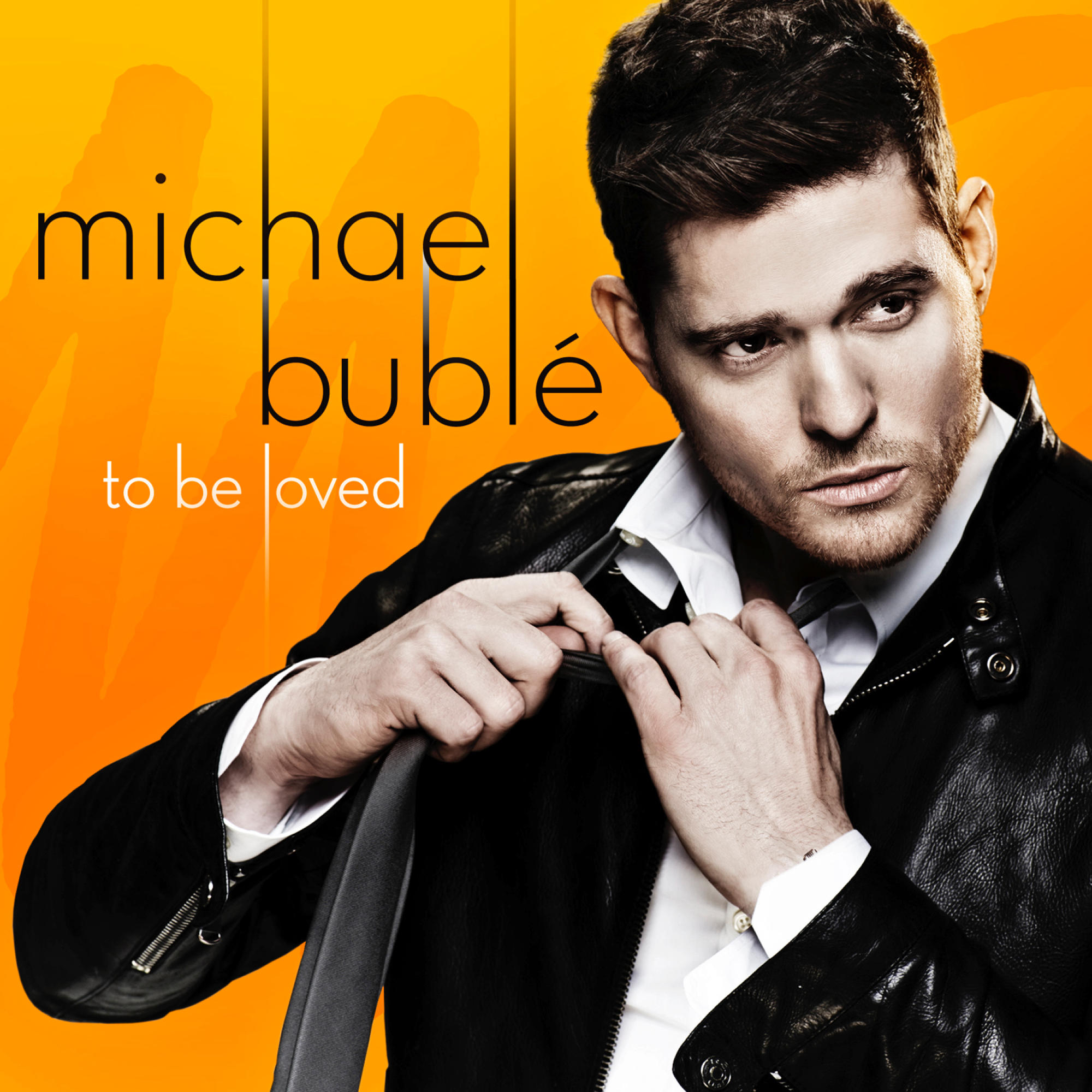 Albumcover von Michael Bublé. Er richtet seine Krawatte, trägt Lederjacke und weißes Hemd vor orangefarbenem Hintergrund.