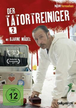 Mann im weißen Anzug reinigt eine Oberfläche, DVD-Cover der deutschen Show 'Der Tatortreiniger'.