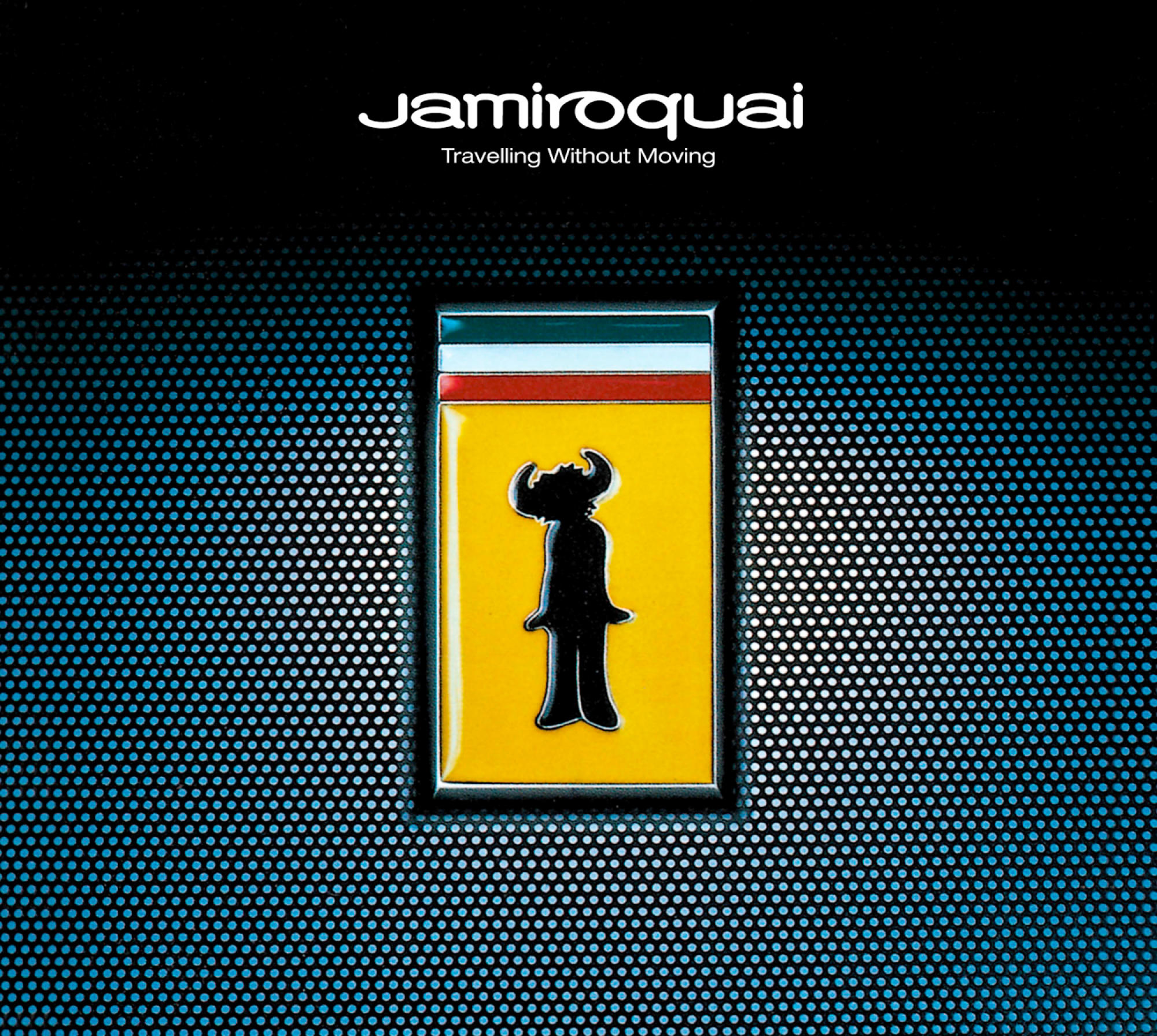Pochette d'album avec un logo stylisé. Fond bleu foncé avec motif texturé. Texte : Jamiroquai.