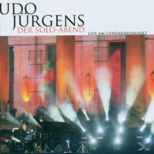 Albumcover mit einer Bühne mit Lichtern und einem Mann in der Mitte. Text lautet 'Udo Jürgens'.