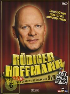 DVD-Cover von Rüdiger Hoffmann, einem glatzköpfigen Mann mit blauen Augen. Text lautet: 'Sex oder Liebe' (Sex oder Liebe).