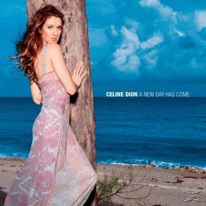 Album borító. Cím: Celine Dion, A New Day Has Come. Nő áll egy fa közelében.