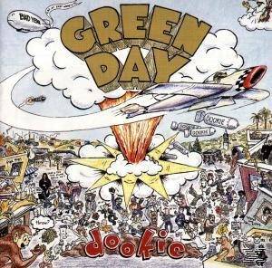 A Green Day 'Dookie' albumának borítója, rajzfilmszerű utcai jelenettel és repülővel.
