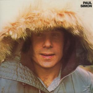 Albumcover: Paul Simon in einer pelzgefütterten Jacke. Sein Gesicht ist der Hauptfokus des Bildes.