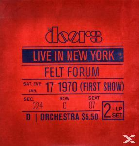 Rotes Albumcover mit Text und Informationen, Vintage-Stil.