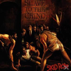 Albumcover mit einer Gruppe von Männern, einige halten Waffen. Text: 'SLAVE TO THE GRIND' und 'SKID ROW'.