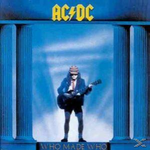 AC/DC-Albumcover. Mann in Schuluniform spielt Gitarre vor Säulen, Titel: Who Made Who.