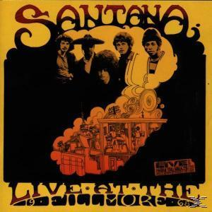Albumcover mit gelbem Hintergrund und schwarzem Bereich mit Bandsilhouette. Die Band heißt Santana.