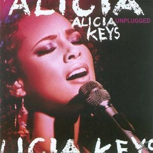 Albumcover von Alicia Keys. Sie singt in ein Mikrofon. Der Hintergrund ist dunkel.