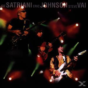 Albumcover: Drei Gitarristen auf der Bühne mit Bühnenbeleuchtung. Der Text enthält Joe Satriani, Eric Johnson, Steve Vai.