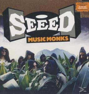 Albumcover: Seed, Music Monks, Menschen auf einem Maisfeld, mit Text und Logo.