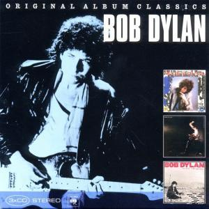 Original Album Classics von Bob Dylan. Dylan spielt Gitarre auf dem Cover, mit drei weiteren Albumcovern.