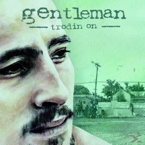 Albumcover von Gentleman, ein Mannsgesicht, grüner Hintergrund, Seitenansicht mit Schnurrbart und Ziegenbart.