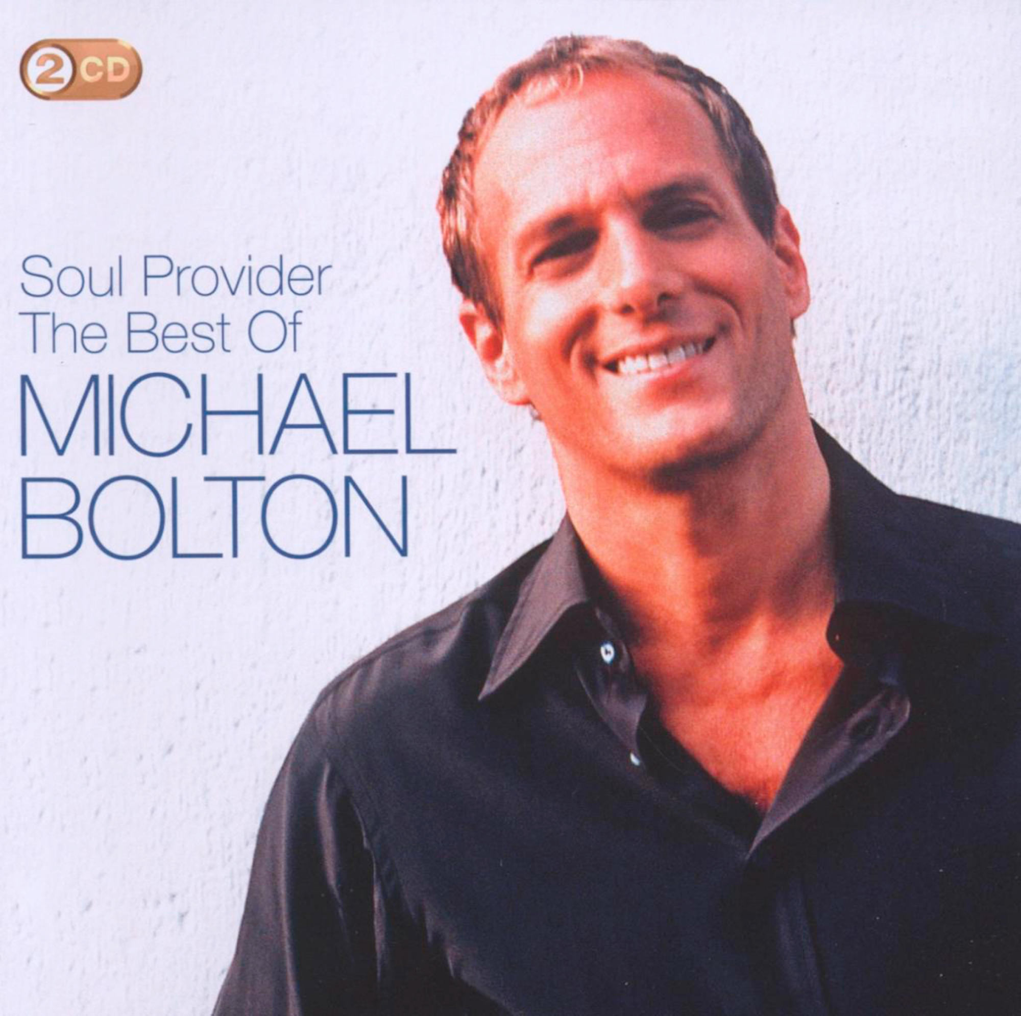 Michael Bolton Albumcover. Ein Mann lächelt mit dem Text "Soul Provider" und "The Best Of".
