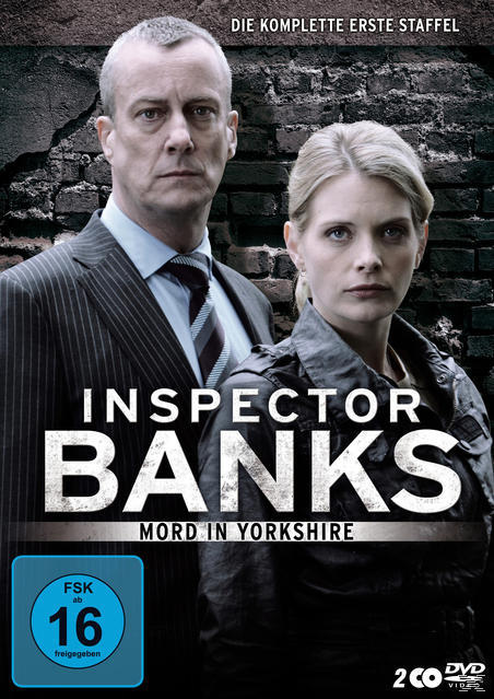 DVD-Cover: Zwei Personen vor einer Backsteinmauer, mit dem Titel 'Inspector Banks', mit einem düsteren und ernsten Ton.