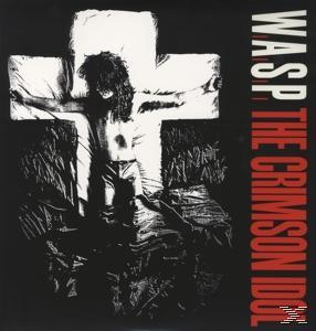 WASP The Crimson Idol Albumcover. Mann am Kreuz mit großem weißen Kreuz im Hintergrund.