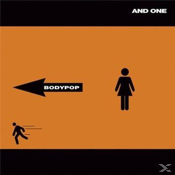 Ein Albumcover mit einer Person, die auf einen Pfeil zuläuft, der auf "BODYPOP" zeigt, und einer weiblichen Strichfigur.