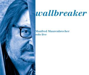 Albumcover mit teilweise verdecktem Gesicht eines Mannes, Text 'wallbreaker'.