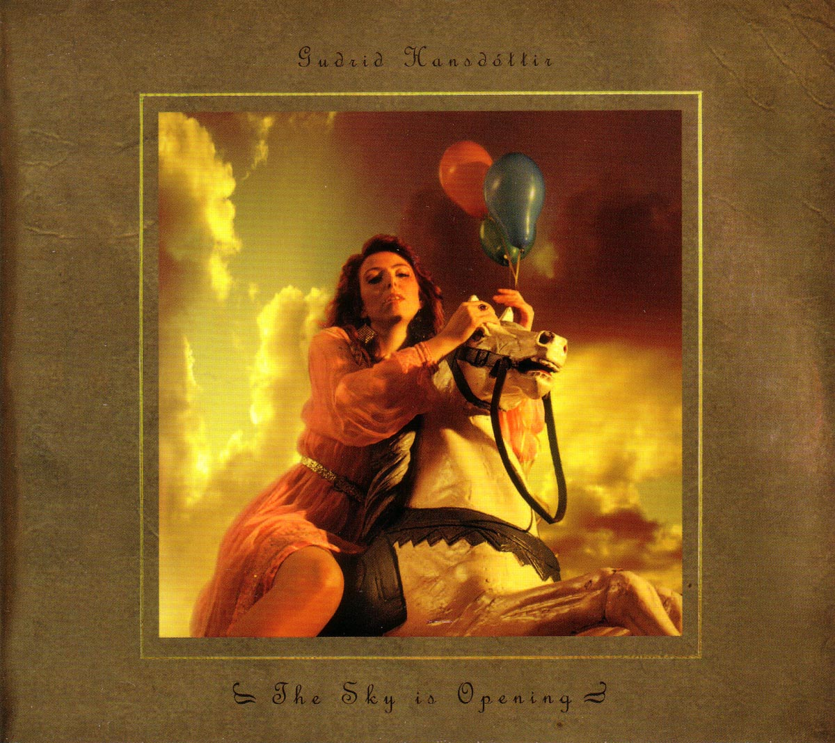 Albumcover mit einer Frau, die Ballons auf einem Pferd hält, und einem Wolkenhintergrund.