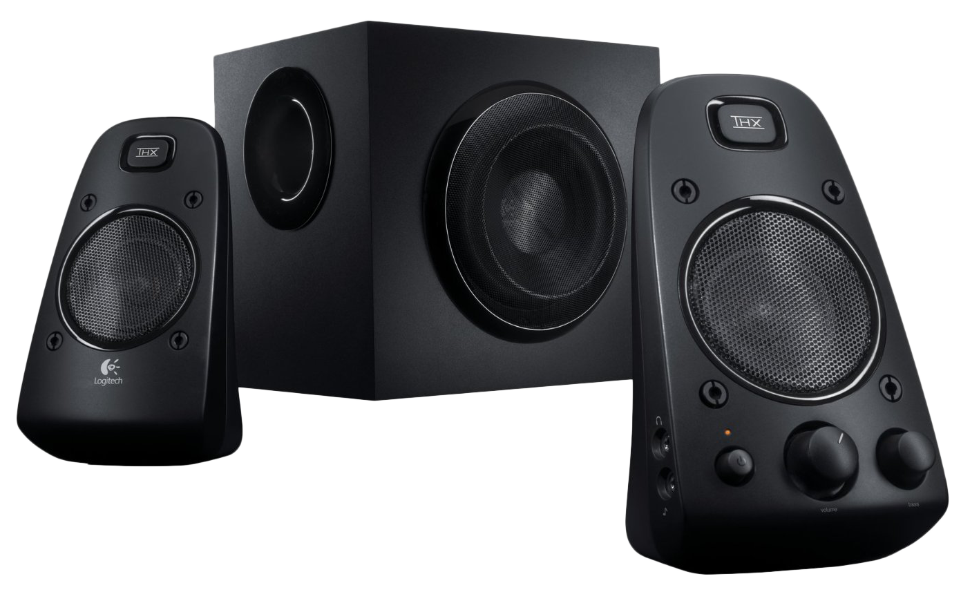 Egy fekete Logitech hangszórórendszer két kis hangszóróval és egy mélynyomóval. A rendszer fekete felületen van.