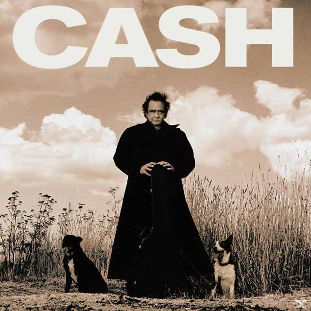 Johnny Cash Albumcover. Cash in schwarzem Mantel, mit zwei Hunden, in einem sepiafarbenen Feld.
