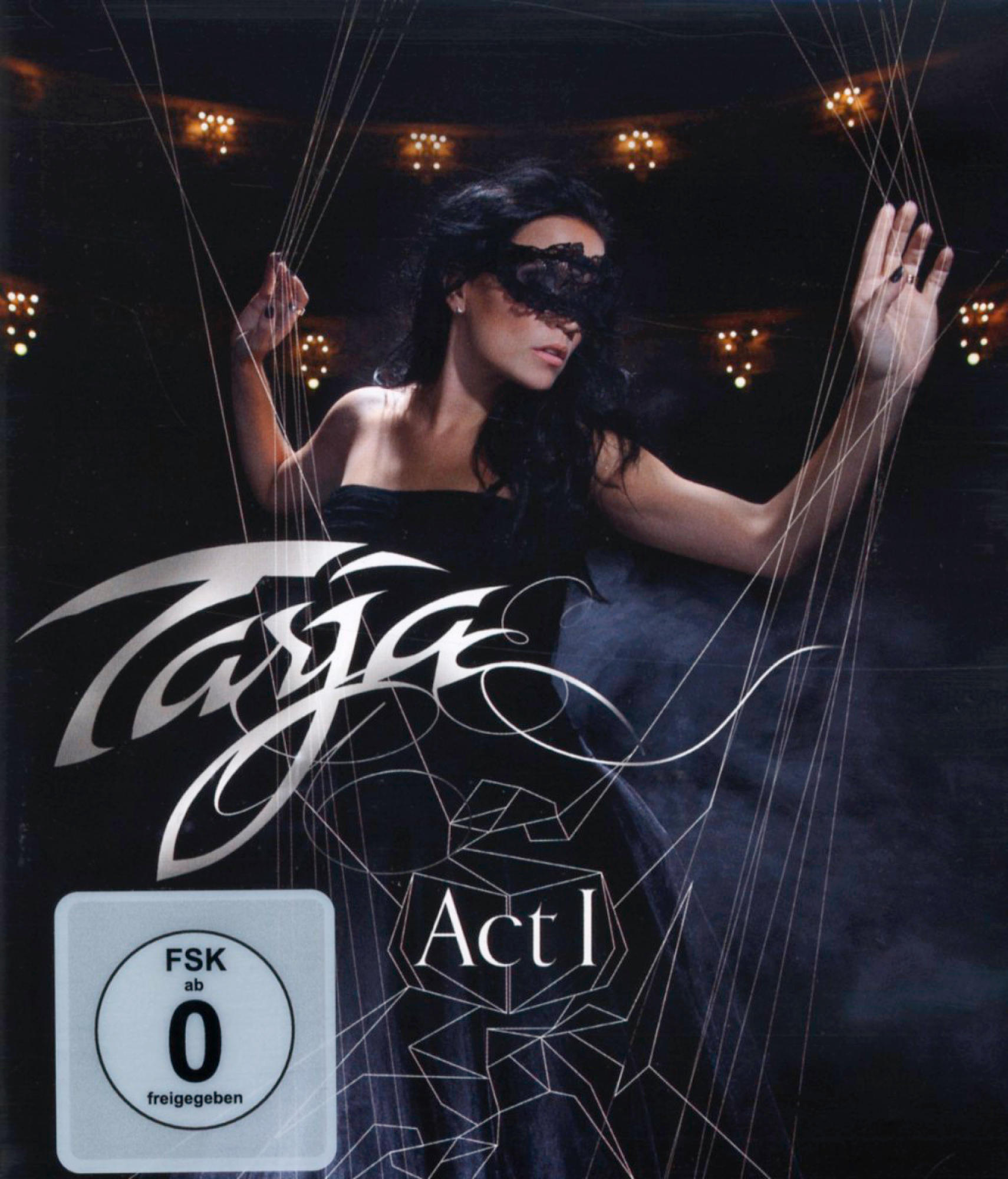 Albumcover mit einer Frau in Schwarz, mit Maske und dem Wort 'Tarja'.