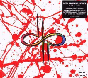 CD-Cover mit farbenfrohem Symbol, roten Farbspritzern und Text für das Devin Townsend Project.