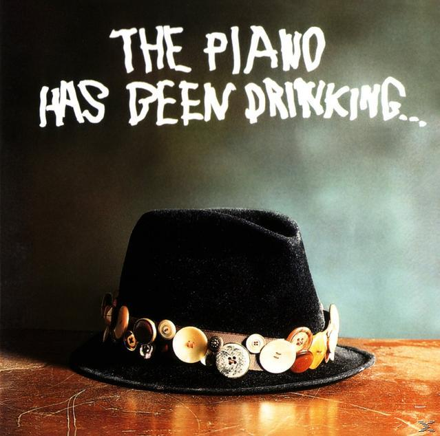 Albumcover eines schwarzen Hutes mit Knöpfen, Titel 'THE PIANO HAS BEEN DRINKING...' in Weiß.