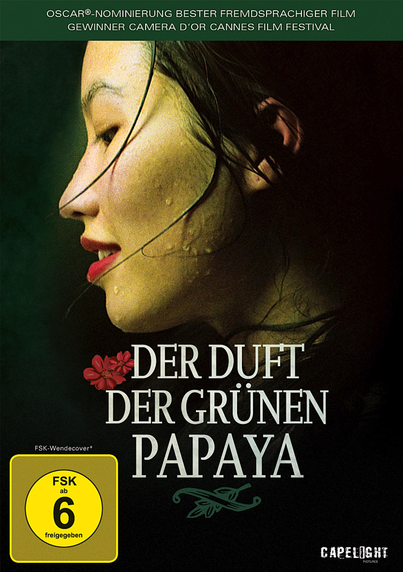 DVD-Cover, das Gesicht einer Frau mit roten Lippen und einer Blume.