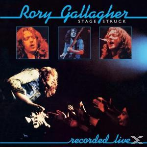 Rory Gallagher speelt gitaar, drie portretten en "Stage Struck" titel.