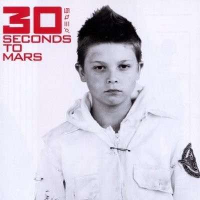 A 30 Seconds to Mars album borítója. Egy fiatal a kamerába néz. A cím és a zenekar neve felül található.