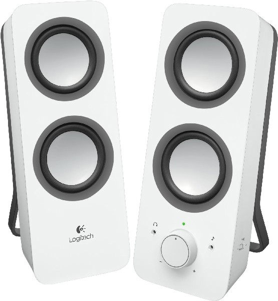 Due altoparlanti per computer bianchi con dettagli neri. Un controllo del volume si trova sull'altoparlante destro.