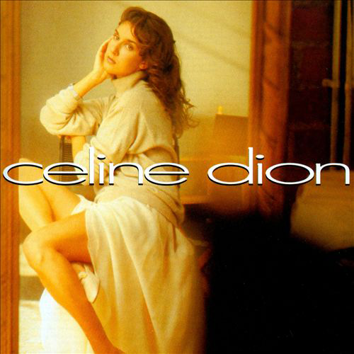 Album borító: Celine Dion ül, félrenéz, fehér szöveggel az előtérben.