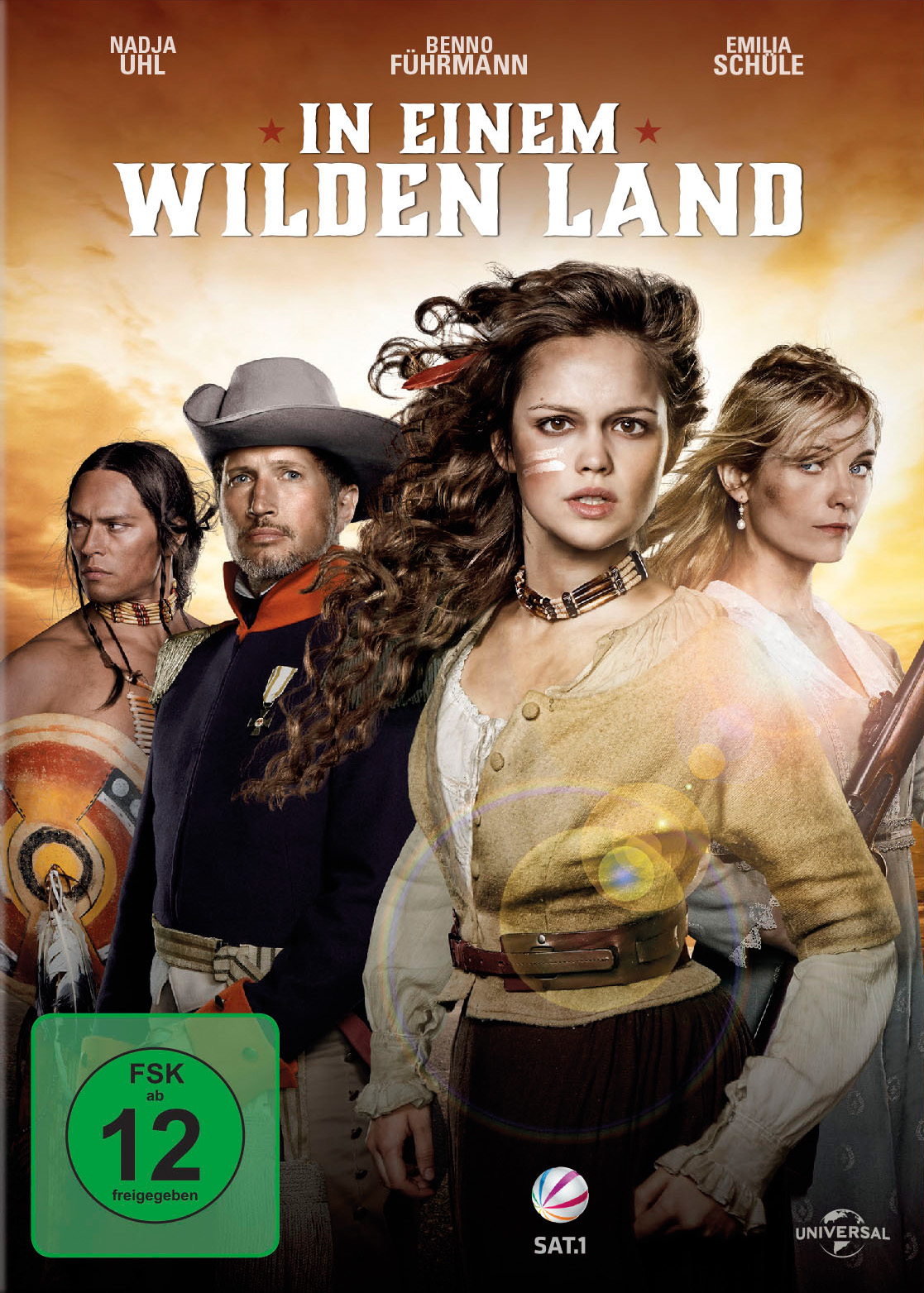 Filmposter mit einer Gruppe von Personen in westlicher Kleidung. Der Titel lautet 'In einem wilden Land'.