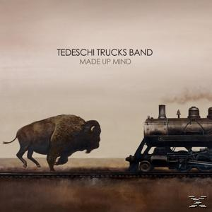 Album borító. Egy bölény elhalad egy vonat mellett a síneken. Szöveg: TEDESCHI TRUCKS BAND, MADE UP MIND.