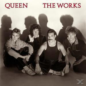 Queen-Bandmitglieder, Schatten im Hintergrund, Albumcover mit dem Titel 'The Works'.