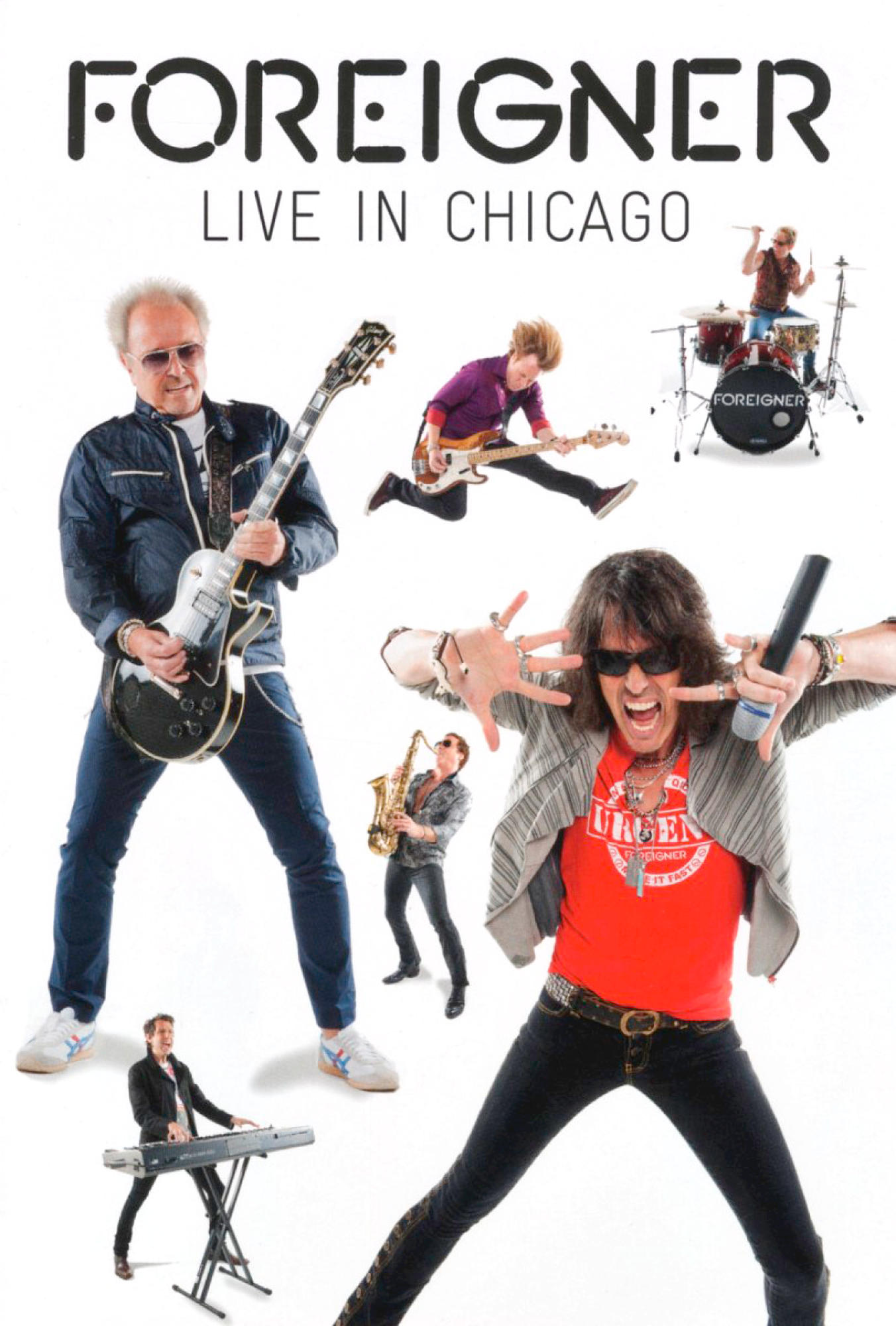 DVD-Cover mit der Band Foreigner auf der Bühne. Mehrere Bandmitglieder spielen Instrumente.