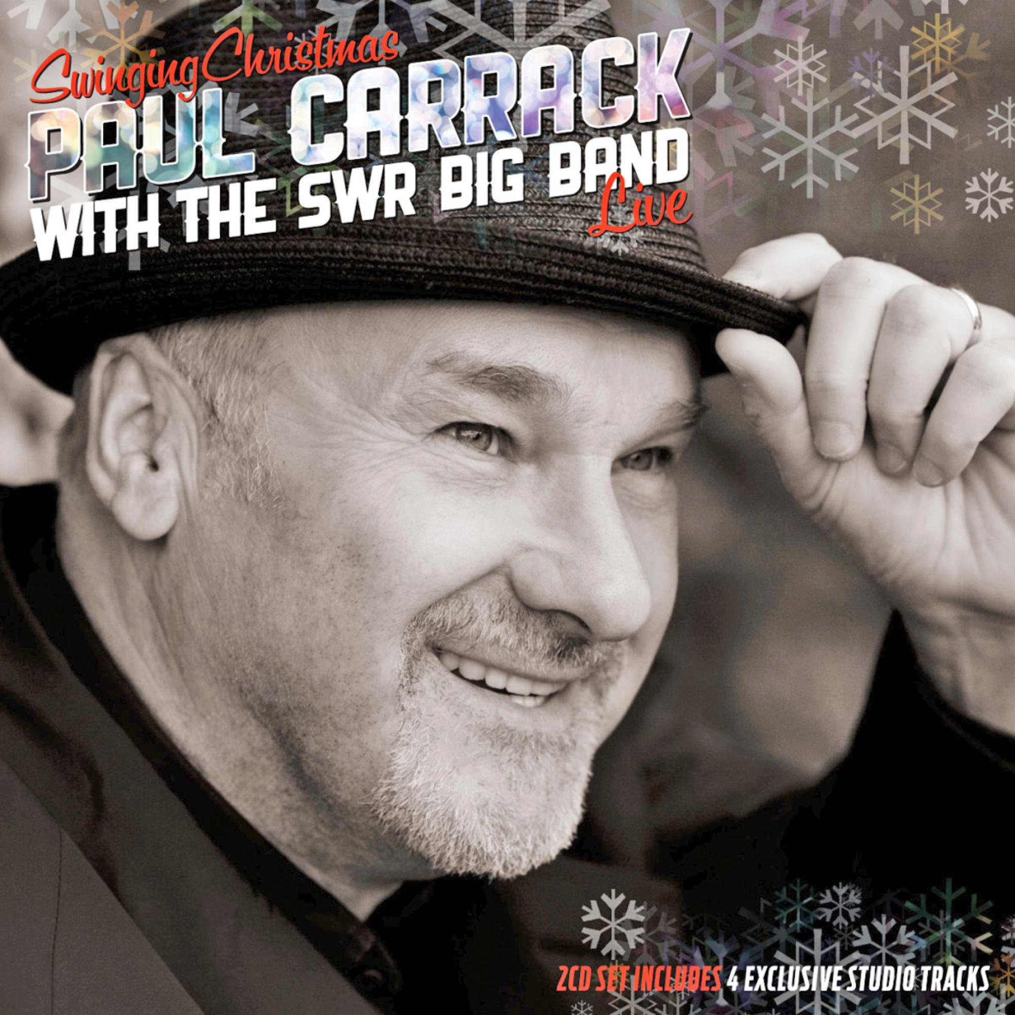 CD-Cover: Paul Carrack mit Hut. Schneeflocken im Hintergrund. Der Titel lautet Swinging Christmas.