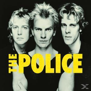 The Police-Albumcover. Drei Männer vor schwarzem Hintergrund, gelber "THE POLICE"-Text.