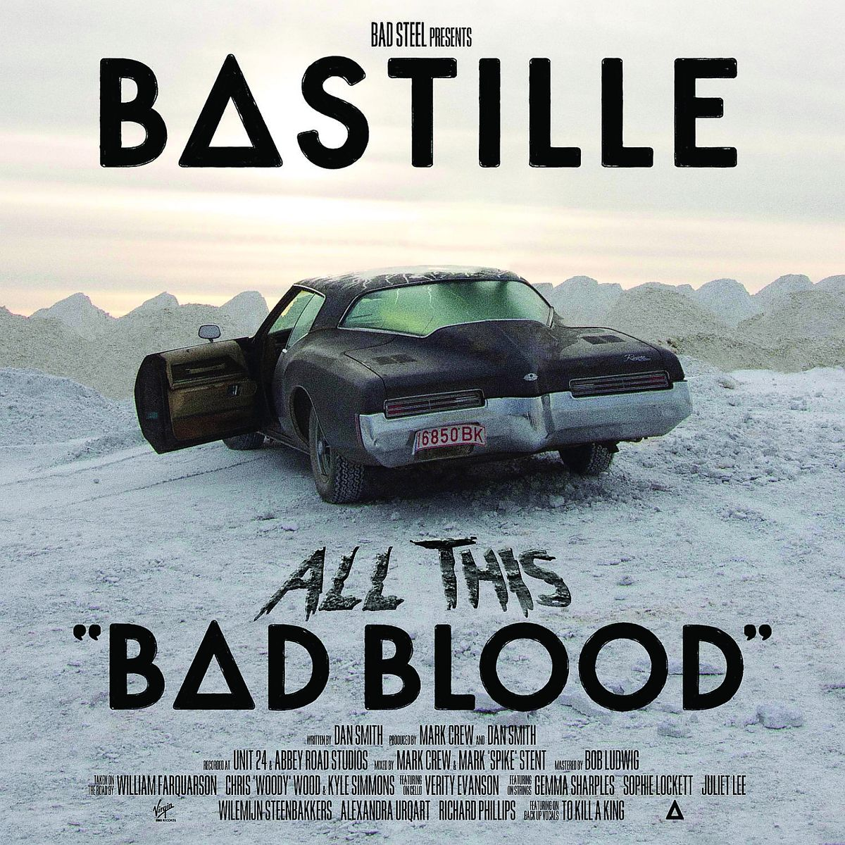 Albumcover: 'Bastille' mit schwarzem Auto auf Eis. Titel 'All This Bad Blood'.